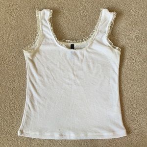 White tank with ruffle trim medium